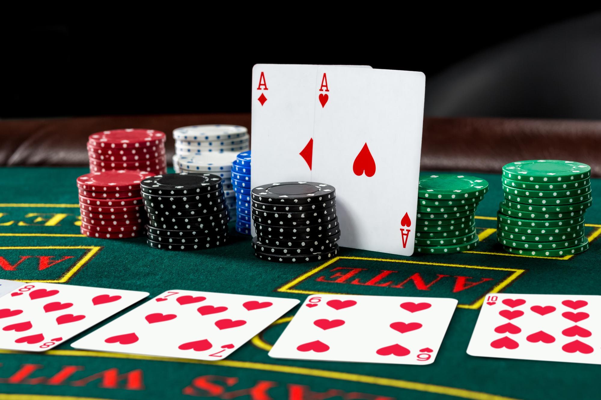 poker-play-chips-cards-green-table (2)-1